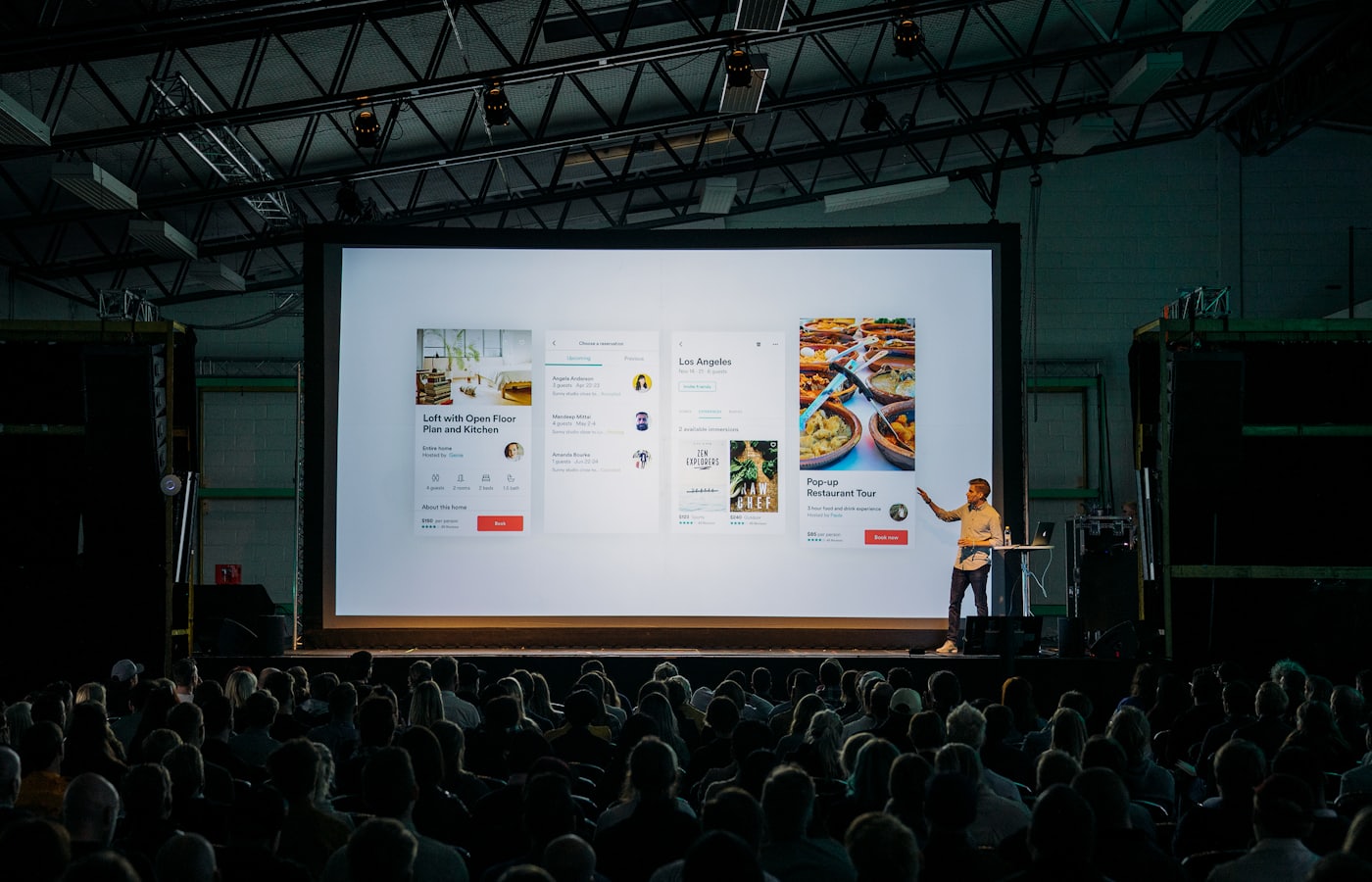 A product launch on the main screen, seen from the back of the room